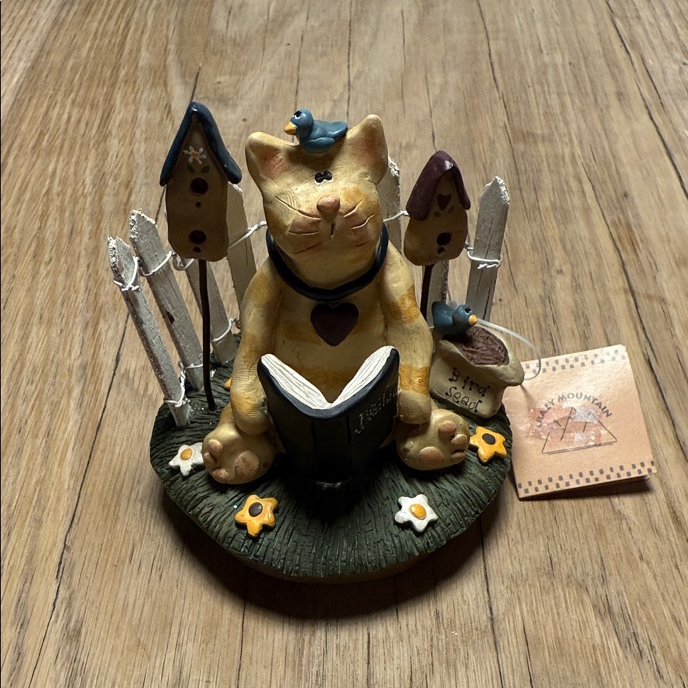 Crazy Mountain Cat Candle Holder with Book and Birdhouses